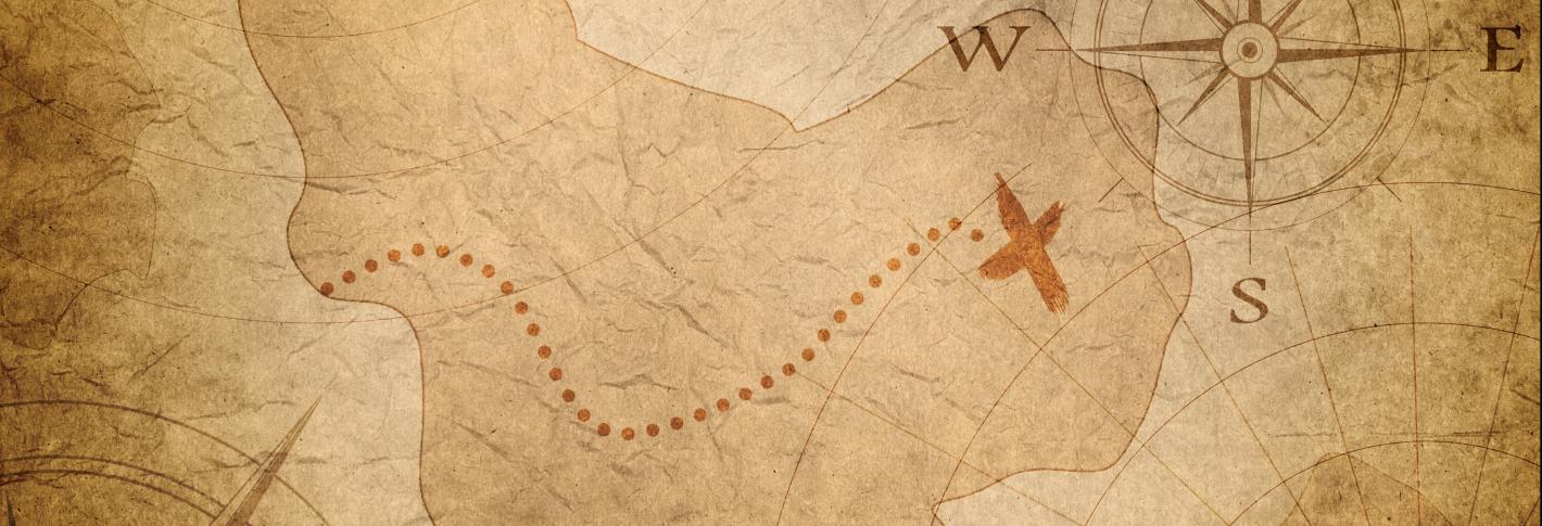 A tan colored treasure map features an island with a dotted line leading to a red X